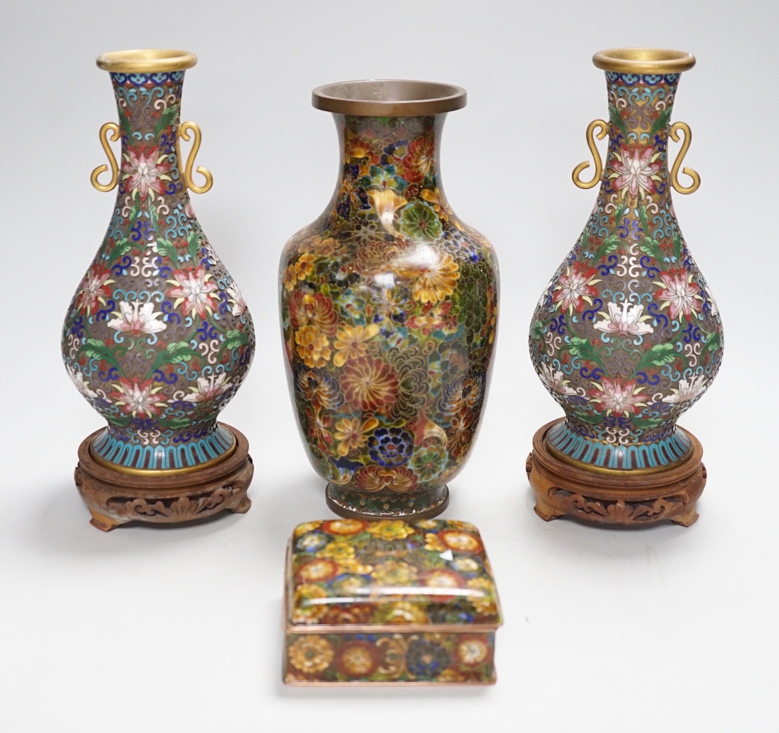A pair of Chinese cloisonné enamel vases, another vase and a box
